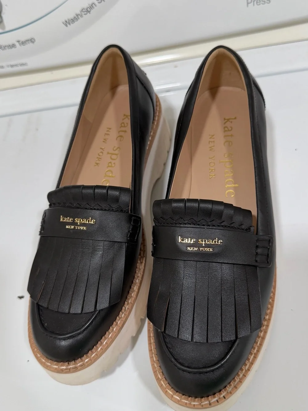 kate spade Black Leather Kiltie Platform Loafers with Cream Sole